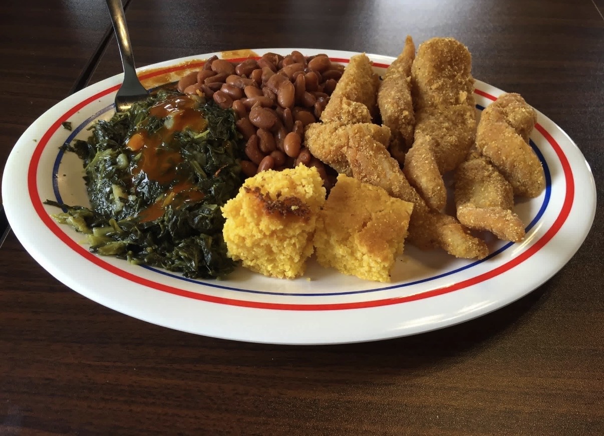 Fried catfish plate with greens, beans and cornbread